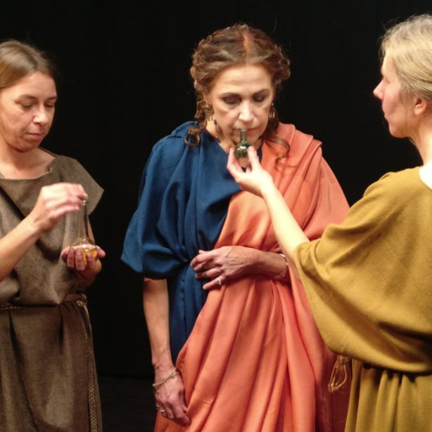 ancient Roman lady smelling perfume